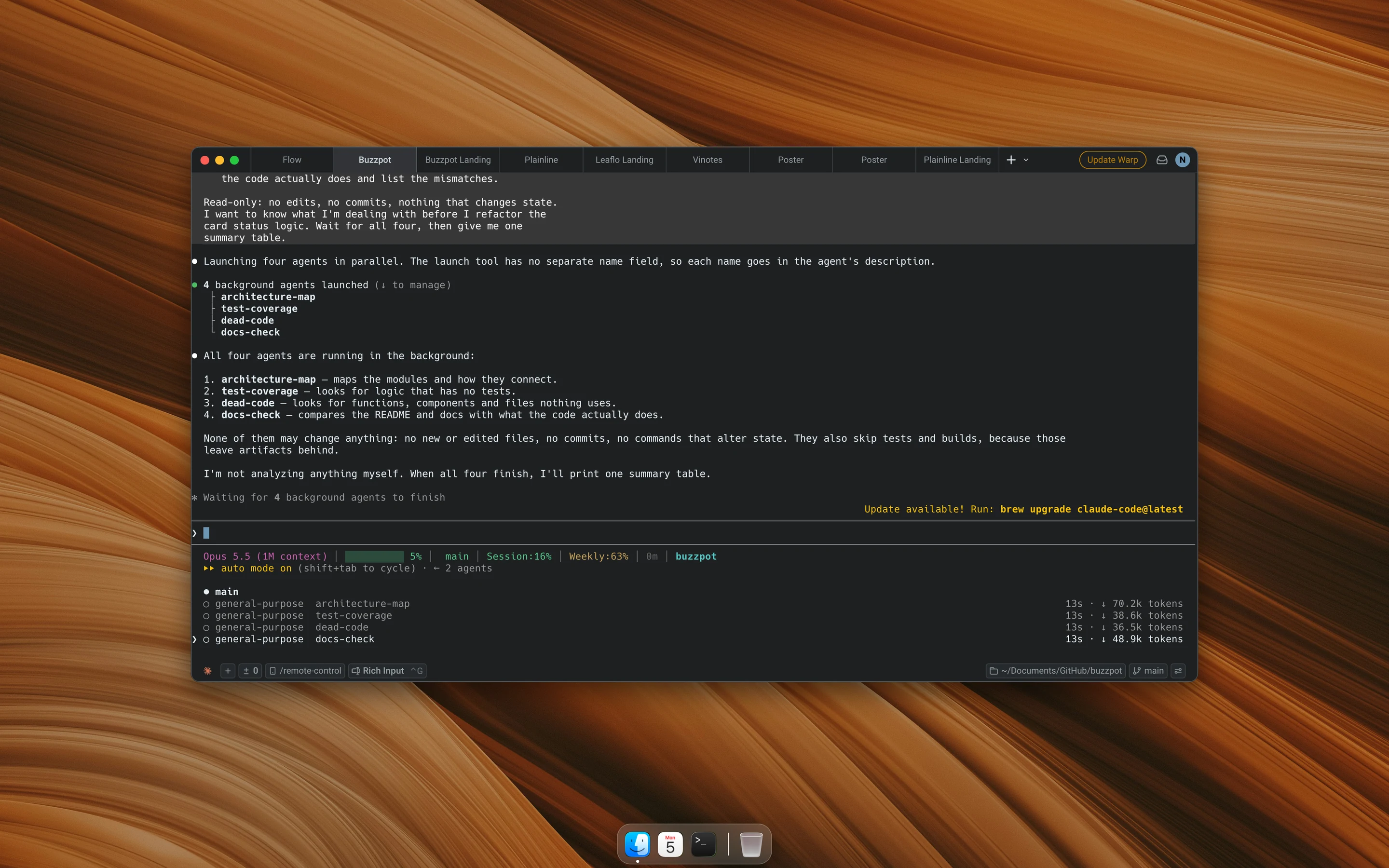 A Claude Code session that launched four background subagents and is waiting for them to finish